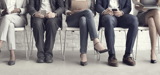 Job candidates awaiting an interview.