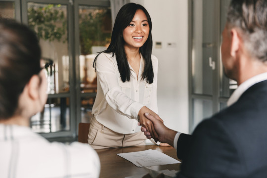 Woman shaking hands